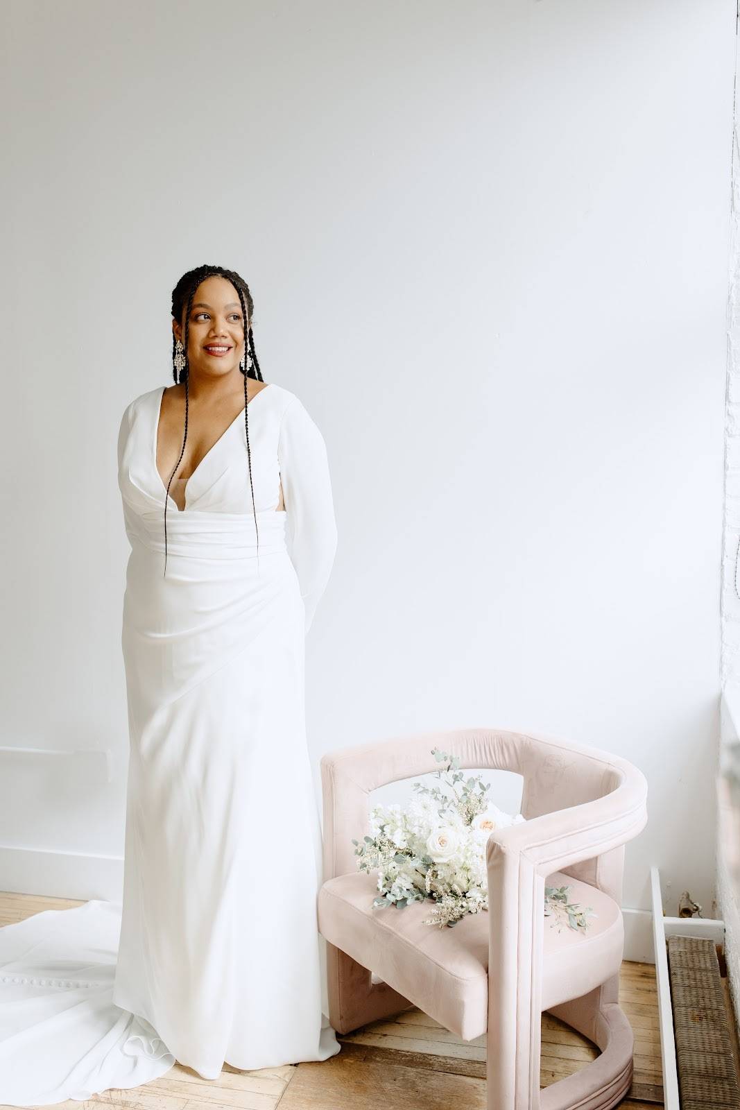 model wearing a white gown