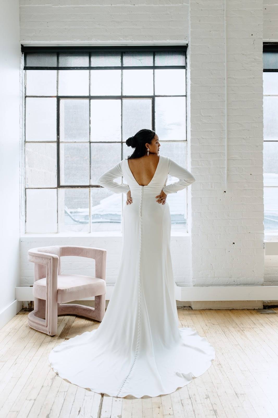 model wearing a white gown
