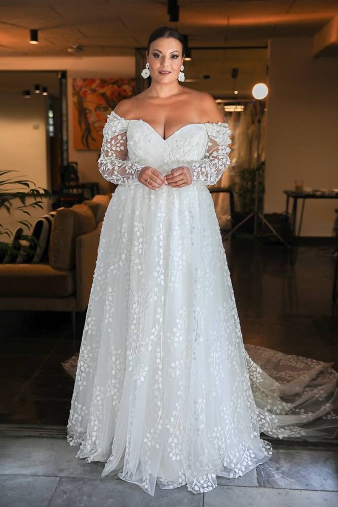 model wearing a white wedding gown