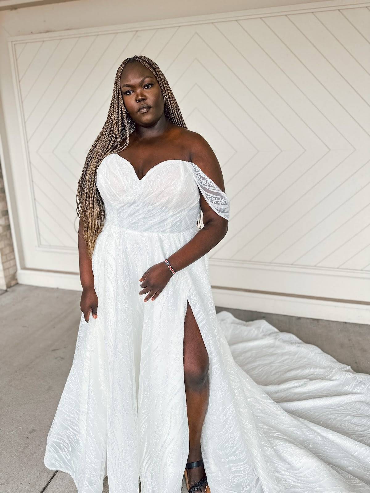 model wearing white gown