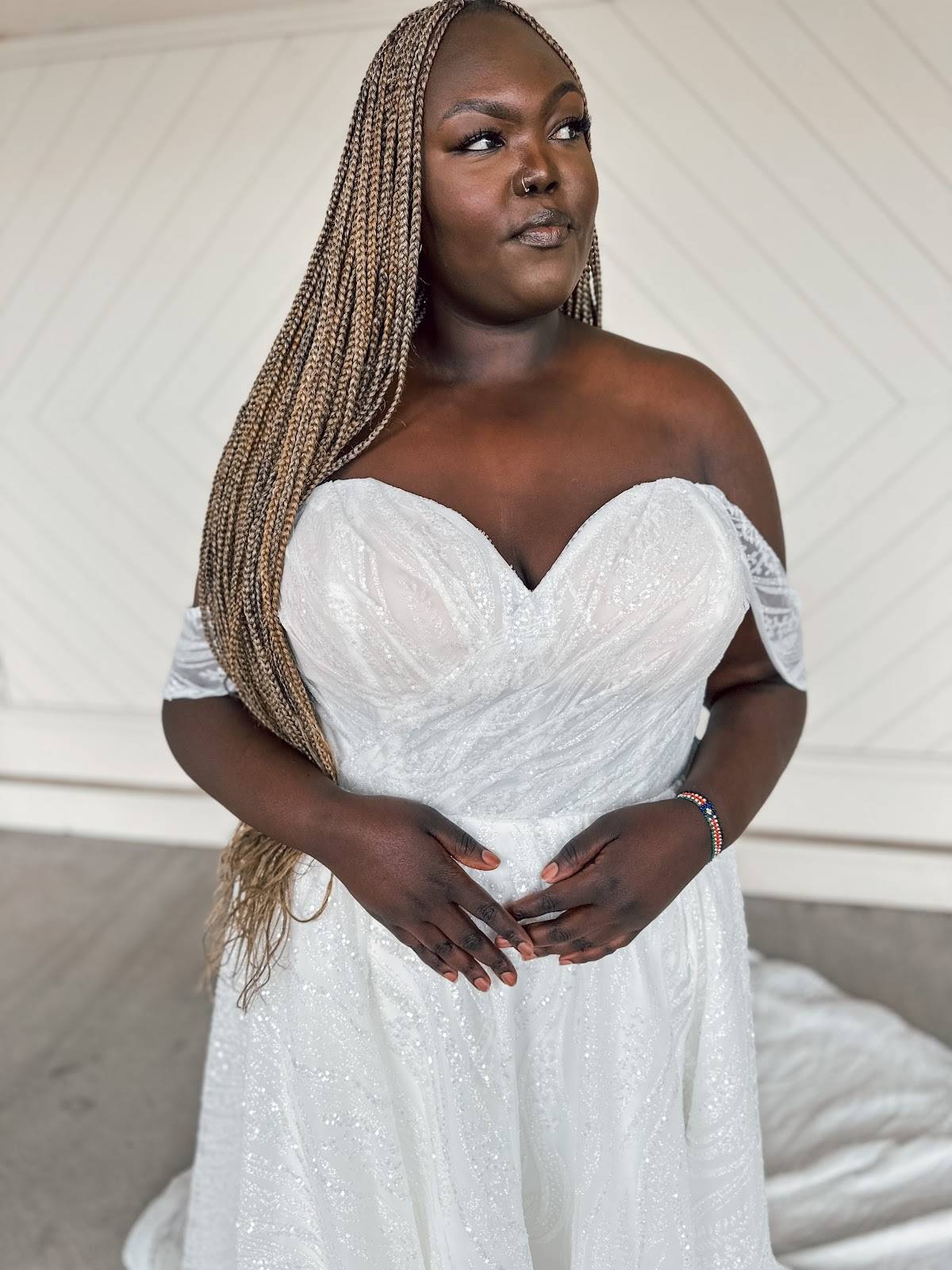 model wearing white gown