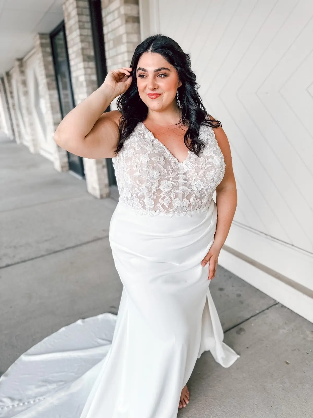 model wearing a floral wedding gown