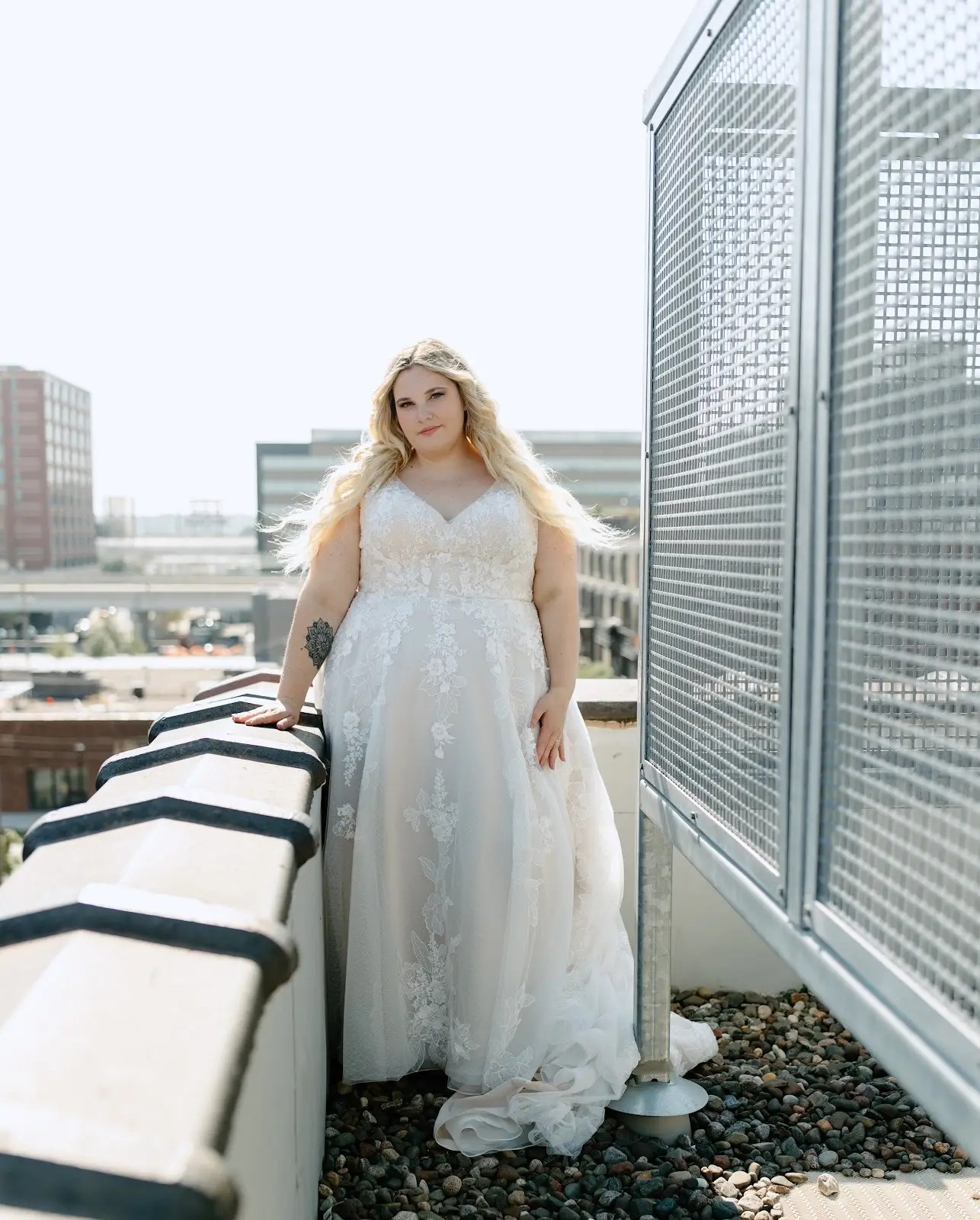 model wearing a floral wedding gown