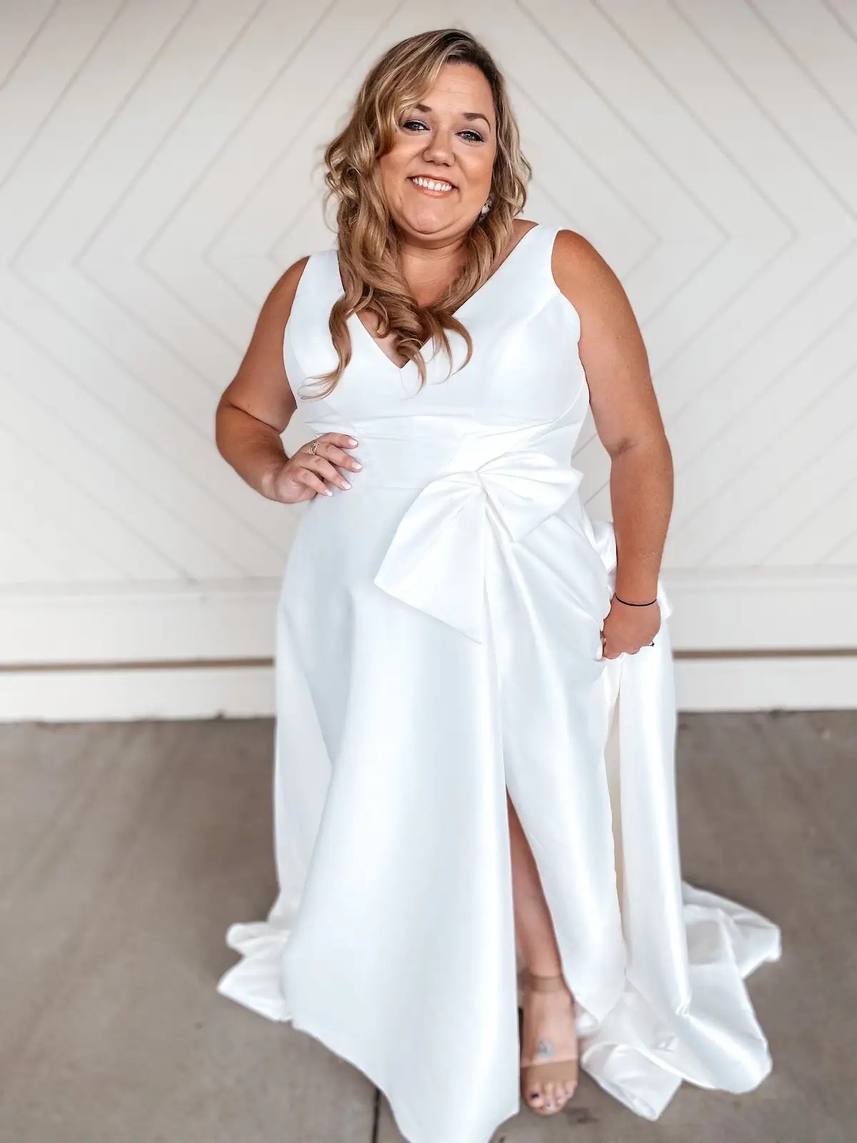 model wearing a white wedding gown
