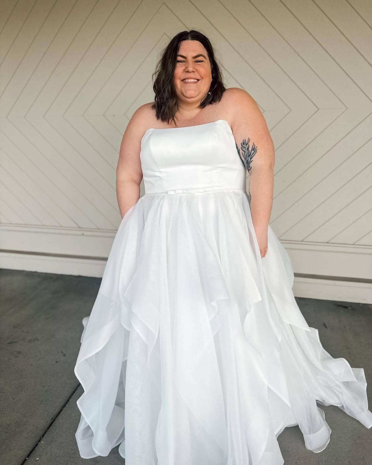 model wearing a white wedding gown