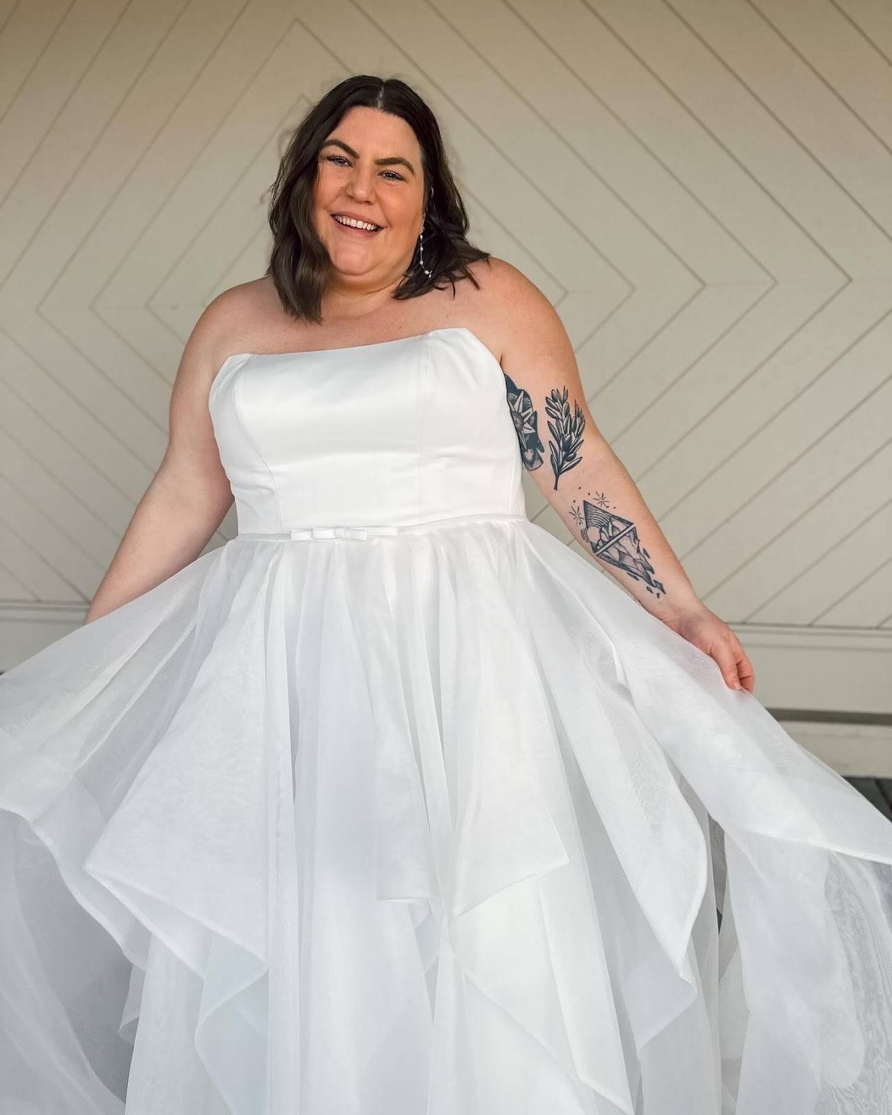 model wearing a white wedding gown