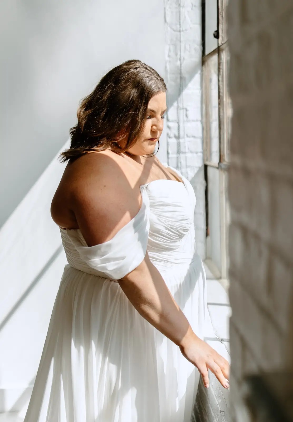white wedding gown close up cut