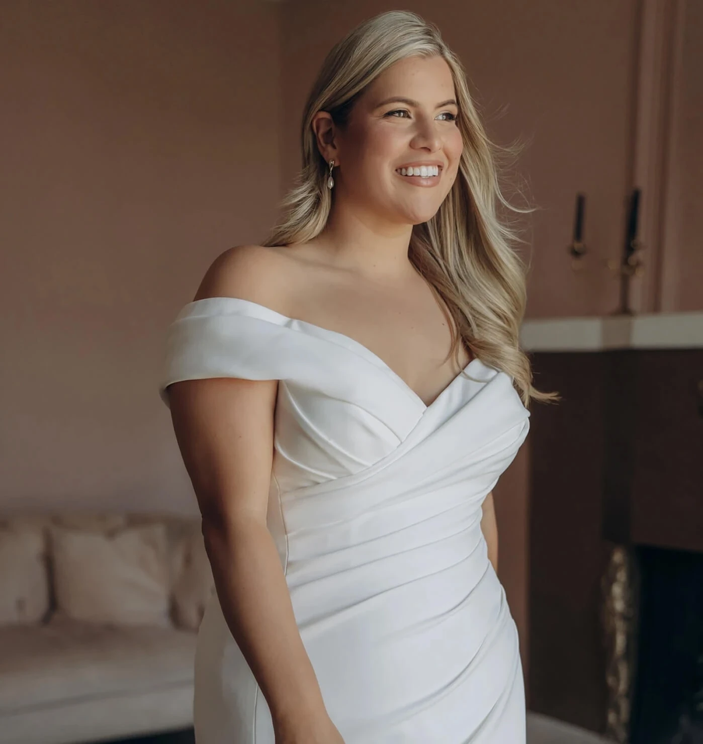 Model wearing a plus size gown