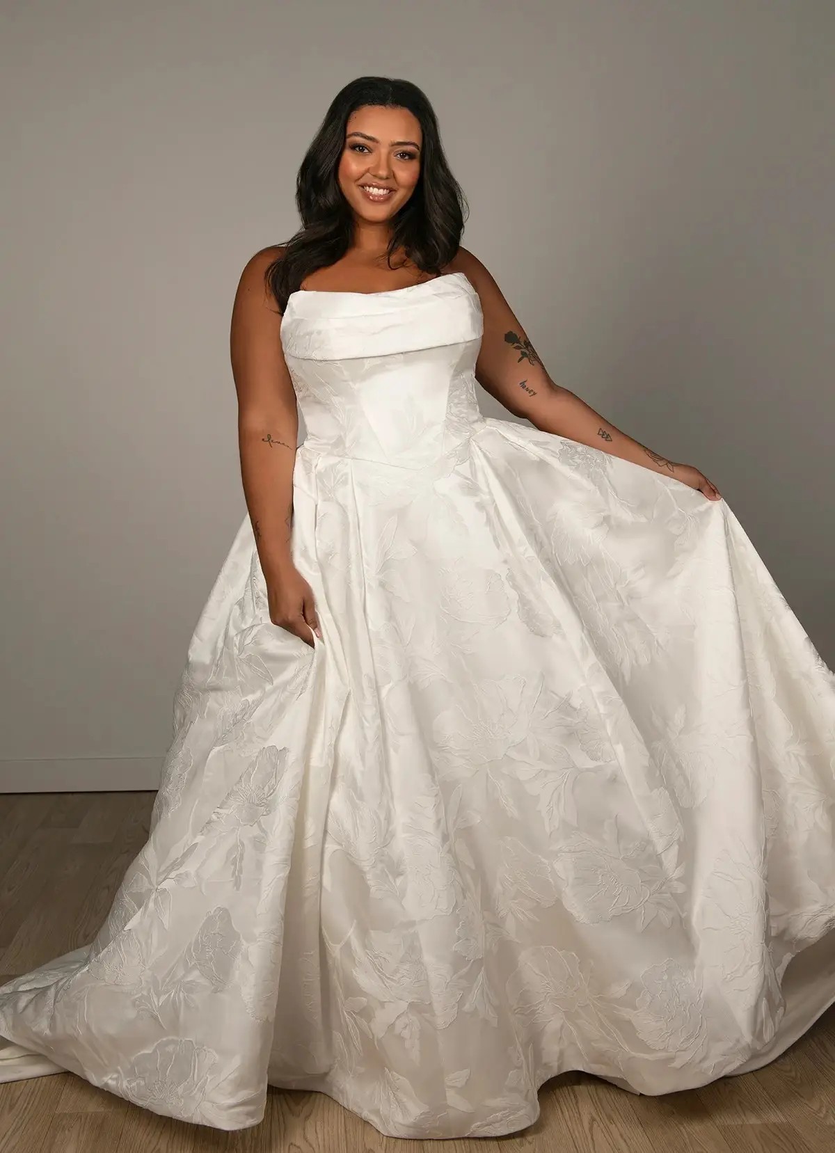 model wearing an Essense of Australia Plus Size gown